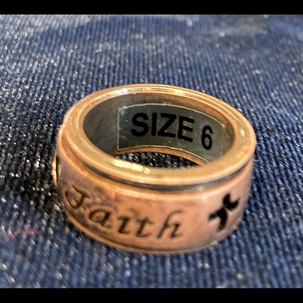 Size 6 copper and silver colored ring with Love, Faith and Hope.
